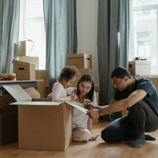 A family using moving boxes