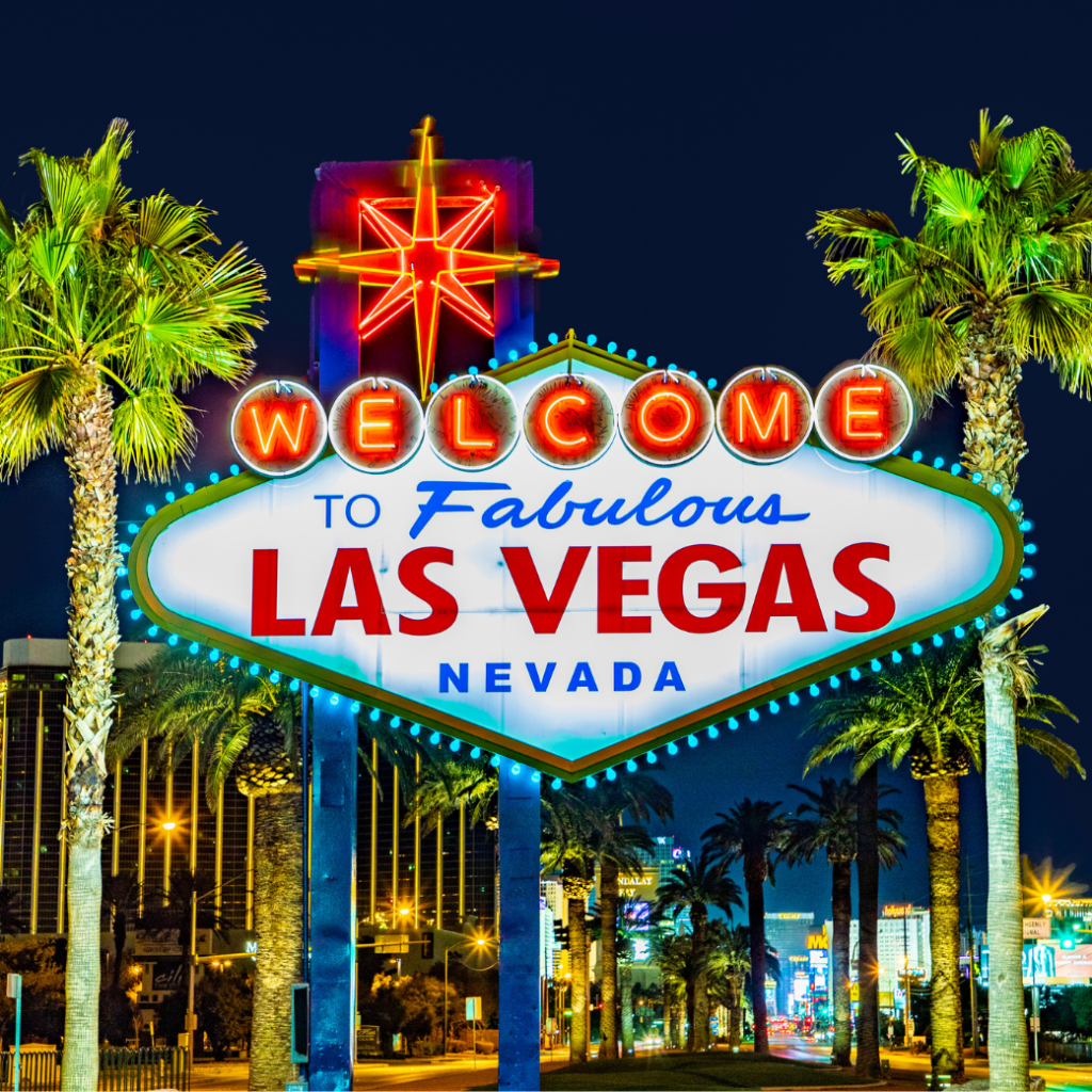 Iconic "Welcome to Fabulous Las Vegas Nevada" neon sign with palm trees.