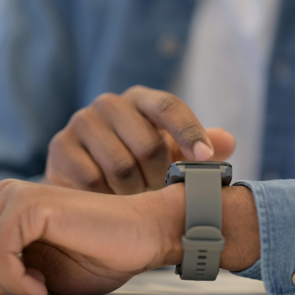 Man's wrist wearing a durable watch