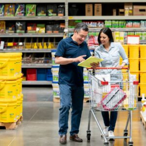 Couple shopping at Sam's Club using a Sam's Club membership deal for teachers.